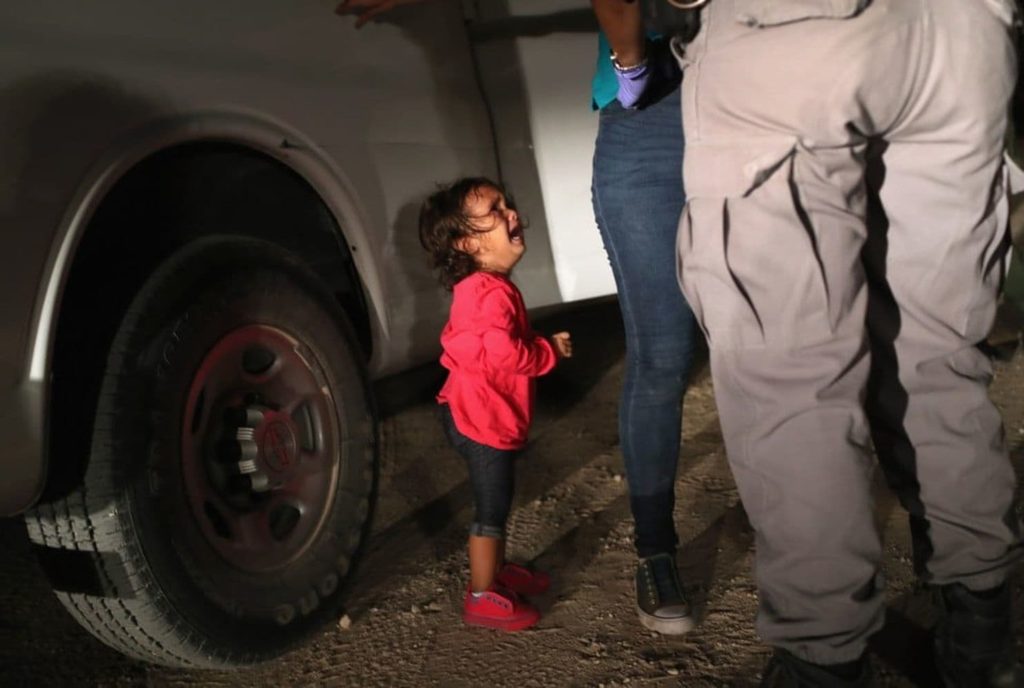 John Moore's now iconic image of a girl crying for her mother during an arrest on the United States/Mexico Border.